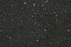 Carbon star SAO21002 and SH2-168